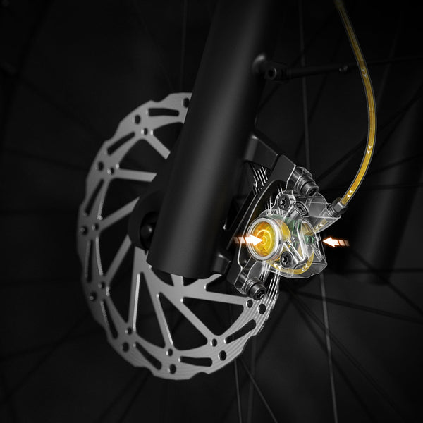 Hydraulic disc brakes on Mokwheel electric mountain bike deliver instant stopping power in all conditions