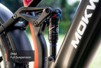 Mokwheel electric mountain bike featuring DNM full suspension for superior shock absorption and ride comfort