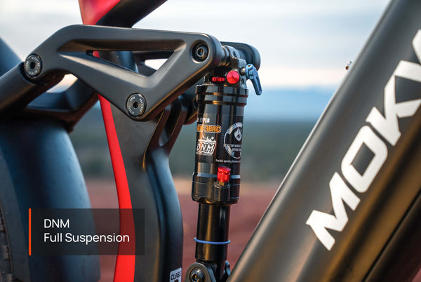 Mokwheel mountain Obsidian e-bike absorbing bumps with DNM suspension